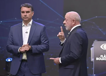 Lula expõe evasivas de Flávio Bolsonaro em debate da Band, enquanto senador foca em provocações e ataques pessoais